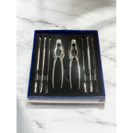Utensilios para el marisco plata